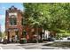 Street view featuring a brick building with an awning and outdoor seating at 1326 Mcpherson Ave., Atlanta, GA 30316