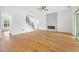 Open living area with hardwood floors, a modern fireplace, and large sliding glass doors at 1375 Harris Rd, Lawrenceville, GA 30043