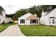 Charming single-story home with a well-manicured lawn and inviting brick and siding facade at 1941 Patterson Park Dr, Lawrenceville, GA 30044