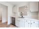 Modern kitchen featuring sleek countertops, stainless steel appliances, and an open view to the dining area at 1941 Patterson Park Dr, Lawrenceville, GA 30044
