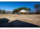 Open-air pavilion in a grassy field, providing a shaded area for outdoor activities and gatherings at 2384 Coach Way, Jonesboro, GA 30236
