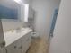 Standard bathroom featuring a vanity, toilet, and tiled shower/tub at 4148 Silver Hill Ct, Snellville, GA 30039