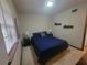 Bedroom with a comfortable bed, side tables, and natural light from the window at 4148 Silver Hill Ct, Snellville, GA 30039