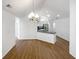 Bright dining area with wood floors, modern lighting, and open layout at 3824 Vineyards Lake Nw Cir # U16, Kennesaw, GA 30144