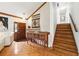 Elegant foyer with high ceilings, wooden accents, decorative console table, and staircase at 3730 Willow Mill Dr, Lawrenceville, GA 30044