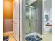Bright and airy bathroom featuring a shower and bathtub combination with a blue bathmat at 6990 Annie Walk, Lithonia, GA 30038