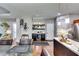 This dining area includes a mini-bar and modern lighting fixtures at 6990 Annie Walk, Lithonia, GA 30038