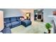 Spacious living room with comfortable sectional and an open view to the bedroom at 6990 Annie Walk, Lithonia, GA 30038