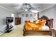 Main bedroom with high ceilings, crown molding and neutral walls at 6990 Annie Walk, Lithonia, GA 30038