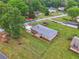 Home boasts beautiful landscaping, a large yard, and convenient driveway access at 815 Tanner Rd, Dacula, GA 30019