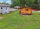 Backyard featuring an additional wooden structure perfect as a shed or playroom at 815 Tanner Rd, Dacula, GA 30019