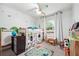 Playful bedroom with a unique bunk bed, cute decor, and carpeted floors at 815 Tanner Rd, Dacula, GA 30019
