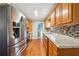Kitchen featuring stainless steel appliances and granite countertops at 815 Tanner Rd, Dacula, GA 30019