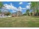 A large, grassy backyard at 1405 Wilmington Way, Grayson, GA 30017