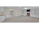 Finished basement featuring a fireplace, custom built-ins and a convenient wet bar area at 1405 Wilmington Way, Grayson, GA 30017
