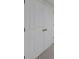 Double door closet featuring white paint and matching trim at 1405 Wilmington Way, Grayson, GA 30017