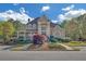 Stately home boasts grand columns, covered porch, manicured landscaping, and timeless appeal at 1405 Wilmington Way, Grayson, GA 30017