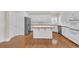 This kitchen offers stainless appliances, wood countertops, an island, and ample storage, for all your cooking needs at 1405 Wilmington Way, Grayson, GA 30017