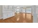 An expansive kitchen with white cabinets, an island, and stainless steel appliances at 1405 Wilmington Way, Grayson, GA 30017