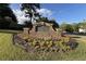 North Forke neighborhood entrance sign with landscaping and blue skies at 1405 Wilmington Way, Grayson, GA 30017