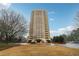 Beautiful building with a circle drive and covered entry with mature trees at 1501 Clairmont Rd # 1624, Decatur, GA 30033