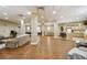 A spacious common room with couches, a kitchen, and tables at 1501 Clairmont Rd # 1624, Decatur, GA 30033