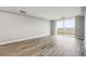 Bright living room boasts an open floor plan with large windows and a sliding glass door at 1501 Clairmont Rd # 1624, Decatur, GA 30033