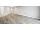 Large living room features sleek flooring and a neutral color palette, perfect for modern living at 1501 Clairmont Rd # 1624, Decatur, GA 30033