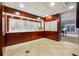 A well-lit mailroom with tile flooring and dark wood cabinets at 1501 Clairmont Rd # 1624, Decatur, GA 30033