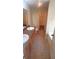 Well-lit bathroom featuring double sinks, linoleum floors, and a separate toilet and bath area at 237 Summergate Ln, Villa Rica, GA 30180
