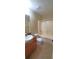 Bathroom with tub-shower combo, vanity with sink and tile flooring at 237 Summergate Ln, Villa Rica, GA 30180