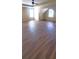 A spacious bedroom with wood-look floors and lots of natural light at 237 Summergate Ln, Villa Rica, GA 30180