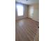 Cozy bedroom featuring natural light and hardwood flooring at 237 Summergate Ln, Villa Rica, GA 30180