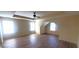 Spacious bedroom with wood floors, ceiling fan, and multiple windows offering natural light at 237 Summergate Ln, Villa Rica, GA 30180