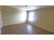 Bright, airy bedroom with hardwood floors and neutral wall colors at 237 Summergate Ln, Villa Rica, GA 30180