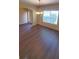 Dining area with modern chandelier and bright window at 237 Summergate Ln, Villa Rica, GA 30180