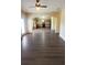 A spacious living room featuring stylish flooring and an archway leading to the kitchen at 237 Summergate Ln, Villa Rica, GA 30180
