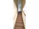 Carpeted staircase with white railing leading to the upper level at 237 Summergate Ln, Villa Rica, GA 30180
