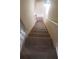 Carpeted stairs lead to the upper level of the home at 237 Summergate Ln, Villa Rica, GA 30180