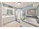 Luxurious bathroom with soaking tub, shower, and double sink vanity at 2940 Blue Sky Pl, Marietta, GA 30068
