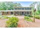 Charming two-story home with a brick facade, well-maintained landscaping, and a welcoming front entrance at 2940 Blue Sky Pl, Marietta, GA 30068