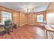 Wood paneled office with built-in shelves and hardwood floors at 2940 Blue Sky Pl, Marietta, GA 30068