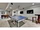 Spacious finished basement featuring a ping pong table, foosball table, and entertainment area at 5023 Buckline Xing, Dunwoody, GA 30338