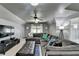Spacious living room featuring a large sectional couch and flat screen TV at 5023 Buckline Xing, Dunwoody, GA 30338