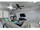 Cozy living room with ample seating, modern decor, and a sleek entertainment center at 5023 Buckline Xing, Dunwoody, GA 30338