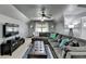 Comfortable living room features a sectional couch, entertainment center, and decorative accents at 5023 Buckline Xing, Dunwoody, GA 30338