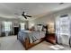 Serene main bedroom with soft lighting, neutral colors, and ample natural light at 5023 Buckline Xing, Dunwoody, GA 30338