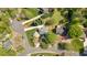 Aerial view of a neighborhood street with mature trees and well-maintained lawns at 4366 Karls Gate Dr, Marietta, GA 30068