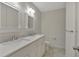 Neutral bathroom with double vanity, quartz countertops, and tile floor at 4366 Karls Gate Dr, Marietta, GA 30068