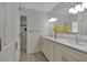 Bright bathroom with double vanity, quartz countertops, and a large mirror at 4366 Karls Gate Dr, Marietta, GA 30068
